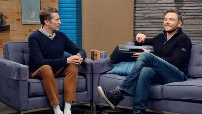Joel McHale Wears a Navy Zip-up and High Tops Summary